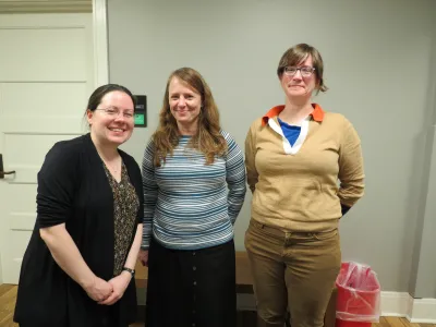 three people posing for a picture