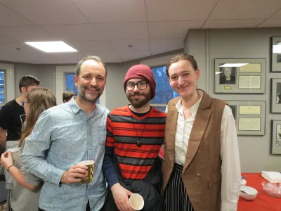 three people standing together