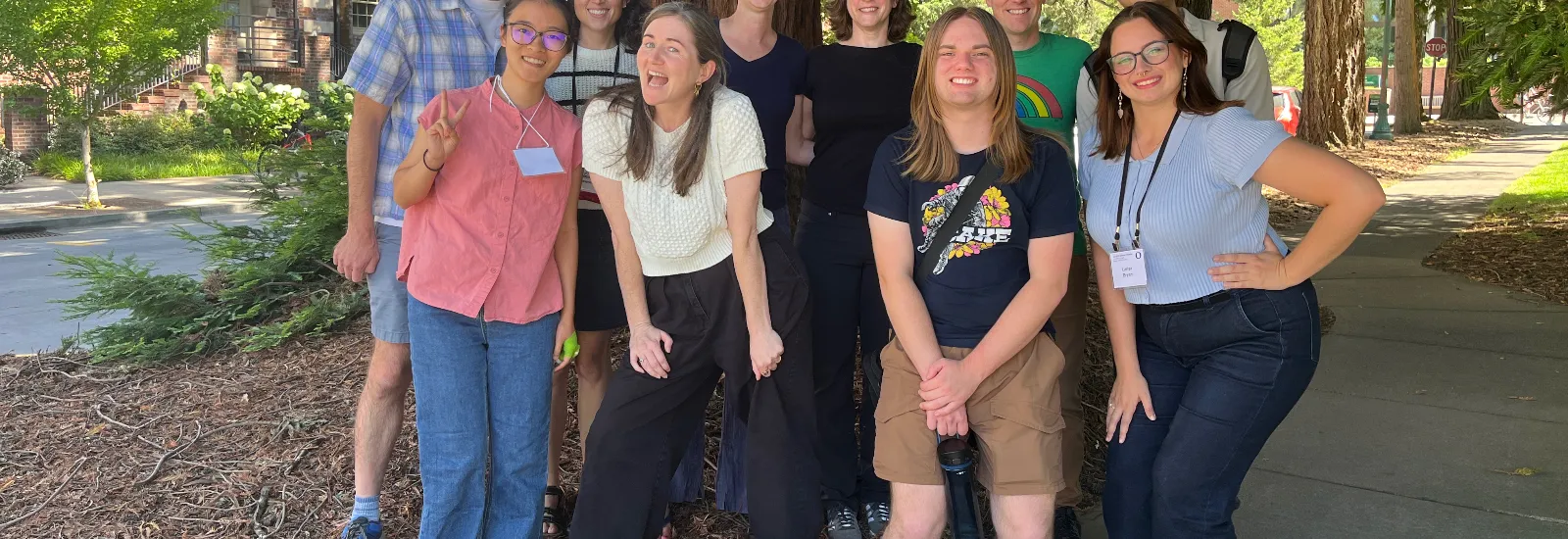 LSA participants standing and posing in front of trees